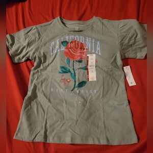 NWT! Sold as is. Size 7/8(M). Rose shirt.